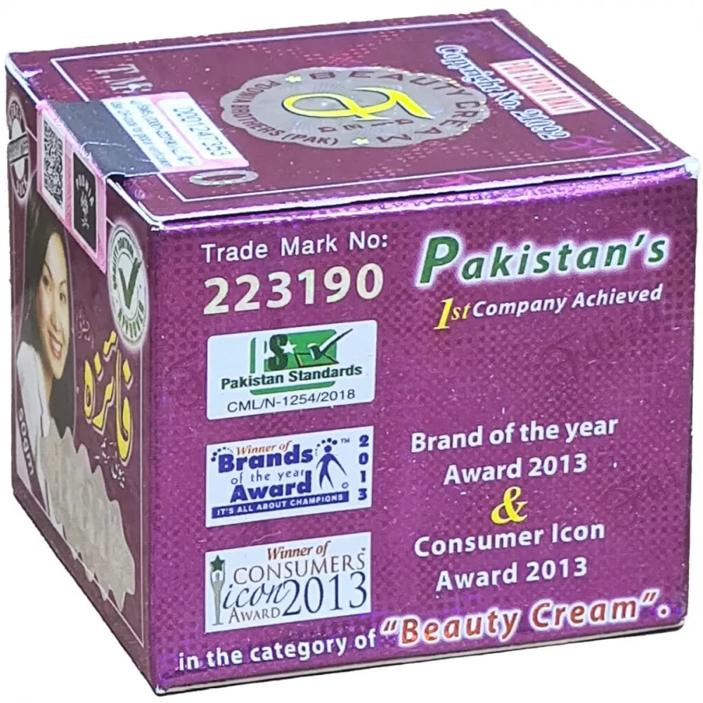 Purple box of Pakistan's first beauty cream company with awards on a white background