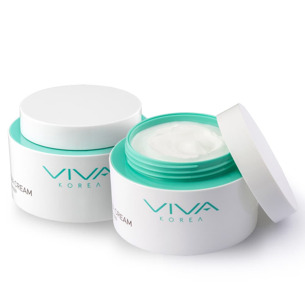Two white cosmetic cream jars with mint green accents on a white background. One jar is closed, and the other is open, showing the white cream inside.