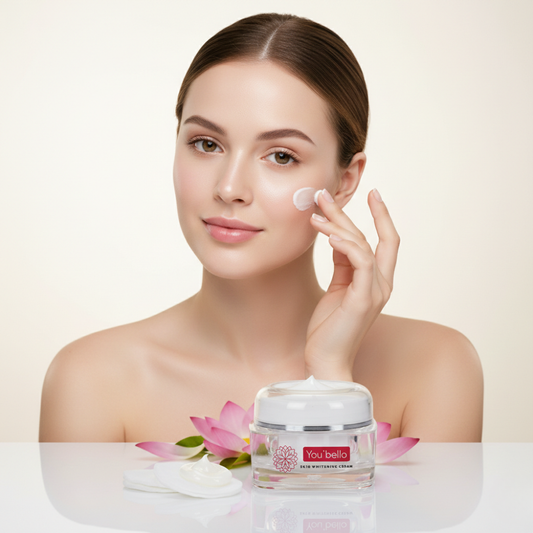 Woman applying cream to her face with a jar of Youbella cream in front of pink lotus flowers on a beige background